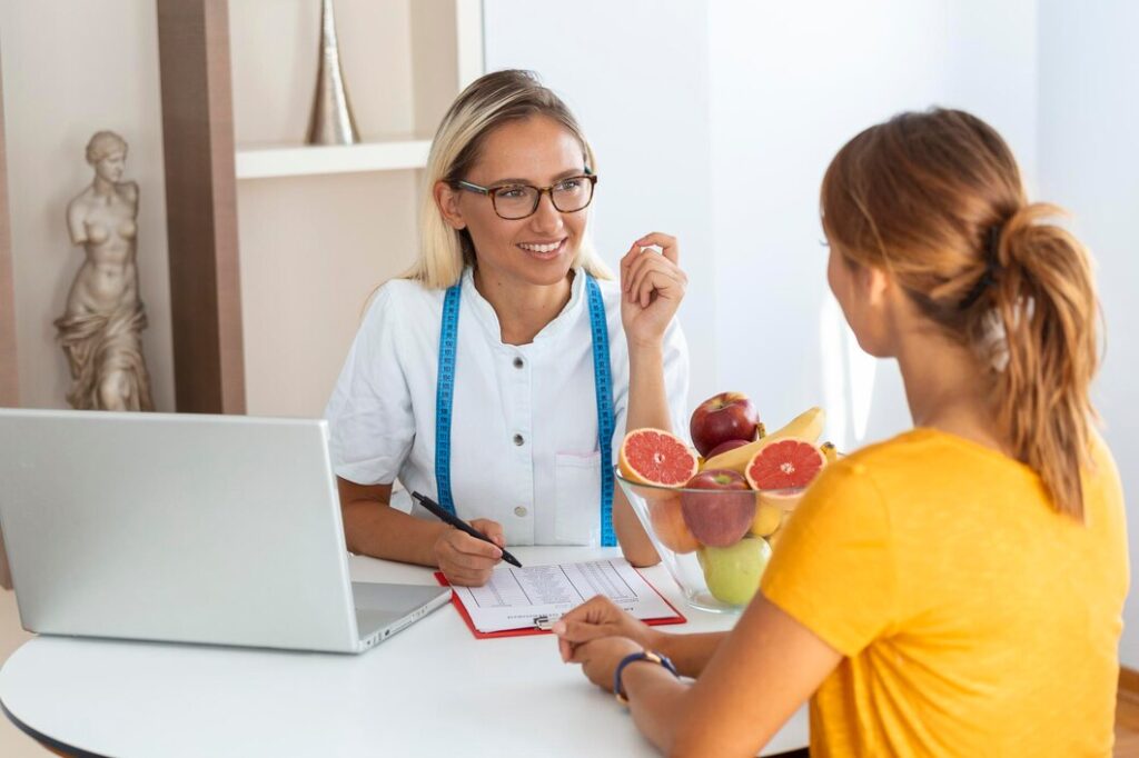 female nutritionist giving consultation patient making diet plan weight loss clinic 657921 288
